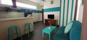 Studio, 1 Queen Bed, Non Smoking, Private Bathroom | Living area | LCD TV