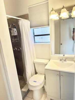 Hair dryer, towels, soap, toilet paper