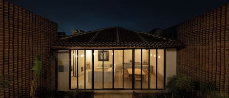 Superior Villa | Living area | Fireplace