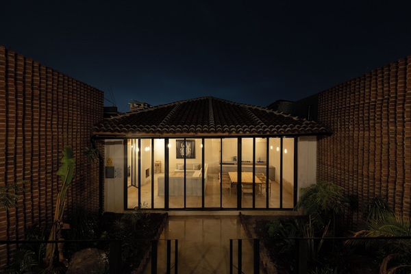 Villa superior | Área de sala de estar | Chimenea