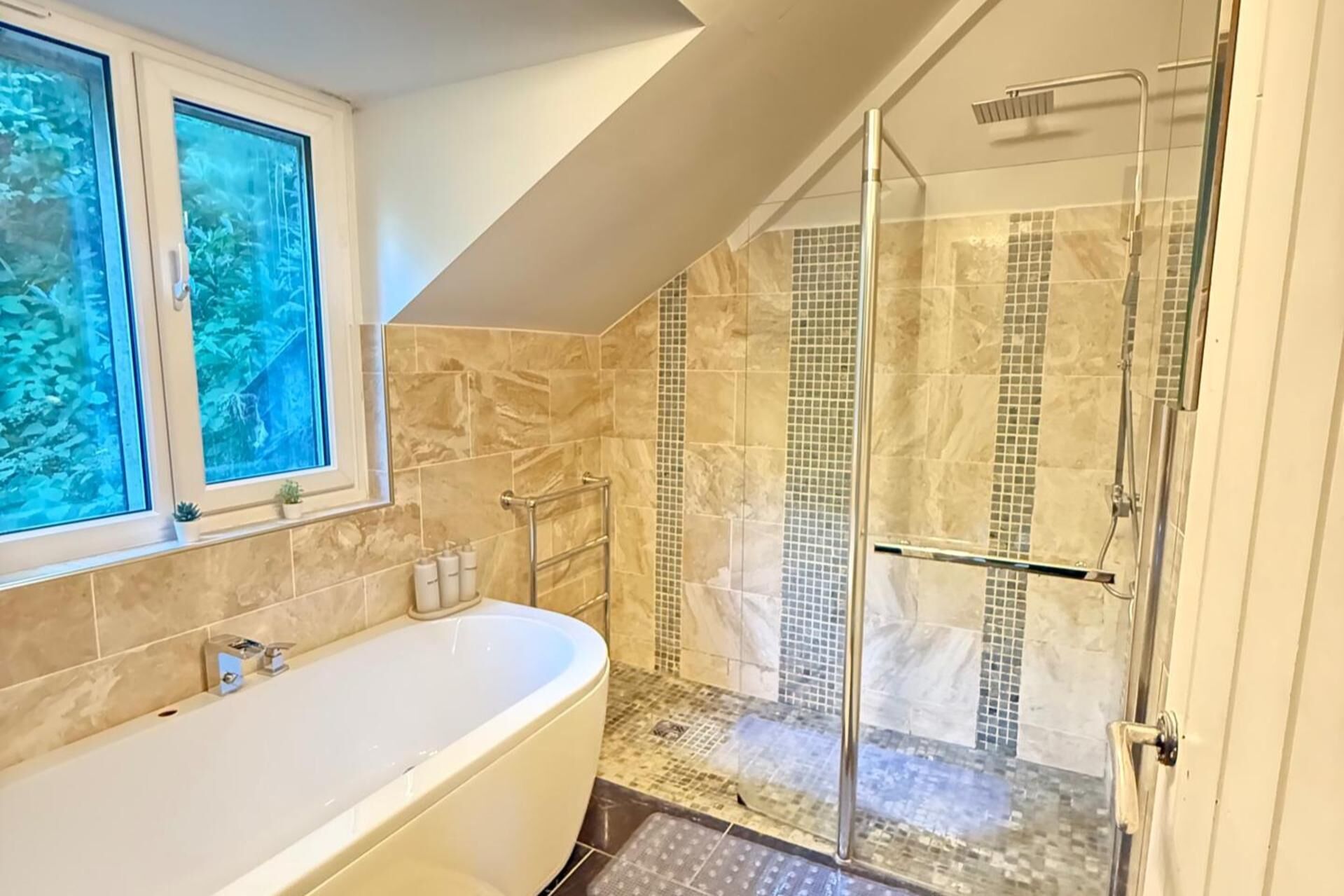 Separate tub and shower, deep soaking tub, hair dryer, towels