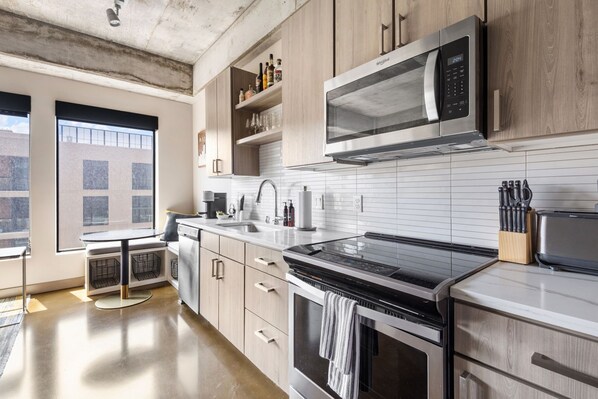 Apartment (1 Bedroom) | Private kitchen | Microwave, oven, stovetop, dishwasher