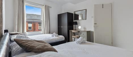 2 habitaciones, tabla de planchar con plancha y wifi gratis