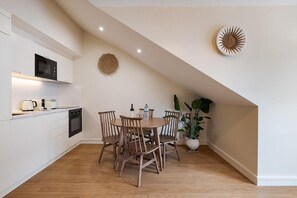 Modern Apartment with Plenty of Natural Light | Private kitchen | Fridge, microwave, oven, stovetop