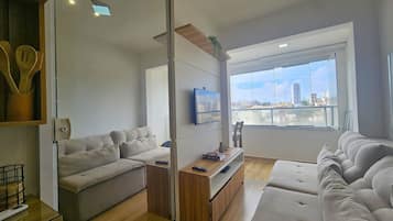 Basic Apartment | Living area | 32-inch Smart TV with digital channels