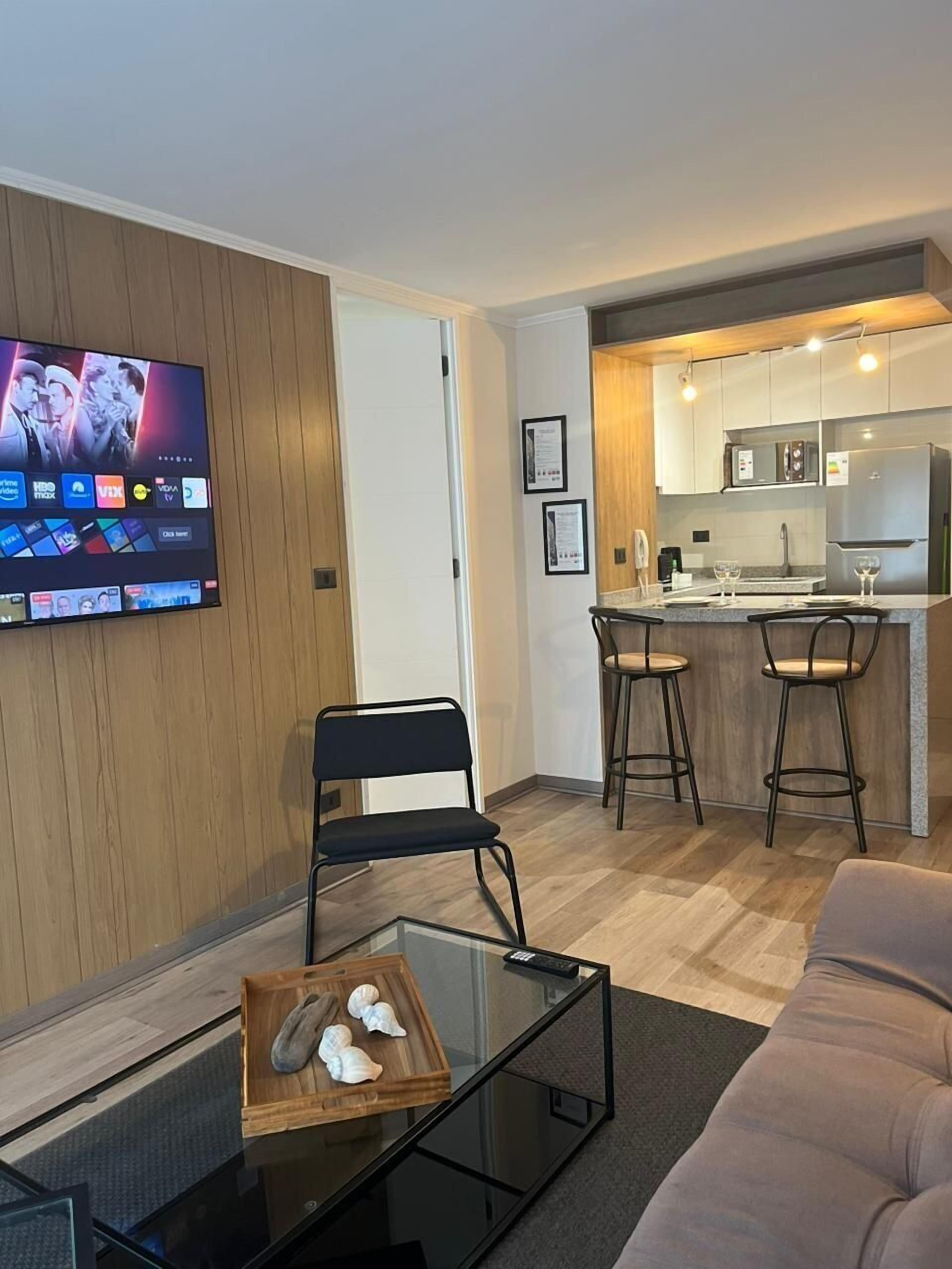 Apartamento | Zona de estar | Smart TV de 55 pulgadas con canales digitales