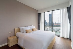 Family Suite, 4 Bedrooms, Club Lounge Access, City View | Egyptian cotton sheets, premium bedding, down comforters - Luxstay Estella Heights Residence (Thành phố Hồ Chí Minh)