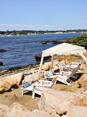 On the beach, sun loungers, beach towels