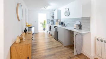 Fridge, microwave, oven, cookware/dishes/utensils