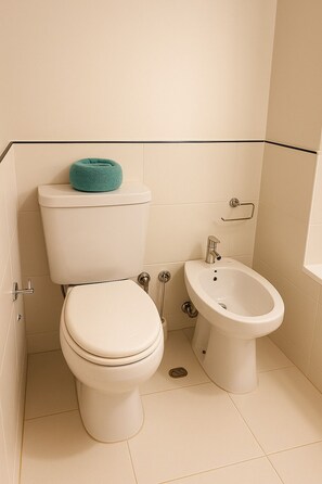 Hair dryer, towels, soap, toilet paper