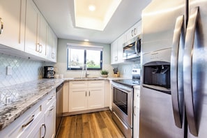 Condo, Multiple Beds, Patio, Pool View (Sea Woods Condo 169) | Private kitchen | Fridge, microwave, oven, stovetop