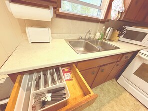 Microwave, oven, stovetop, dishwasher - Classic Grand Ground Level 1 bed Apartment in Downtown Chatham (Chatham)