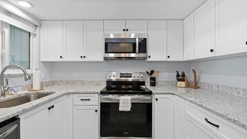 Villa, Multiple Beds, Patio, Pool View (Sea Woods Villa 4350) | Private kitchen | Dining tables