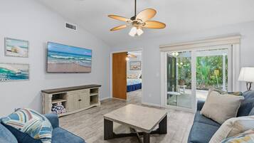 Villa, Multiple Beds, Patio, Pool View (Sea Woods Villa 4350) | Living area | 42-inch flat-screen TV with digital channels