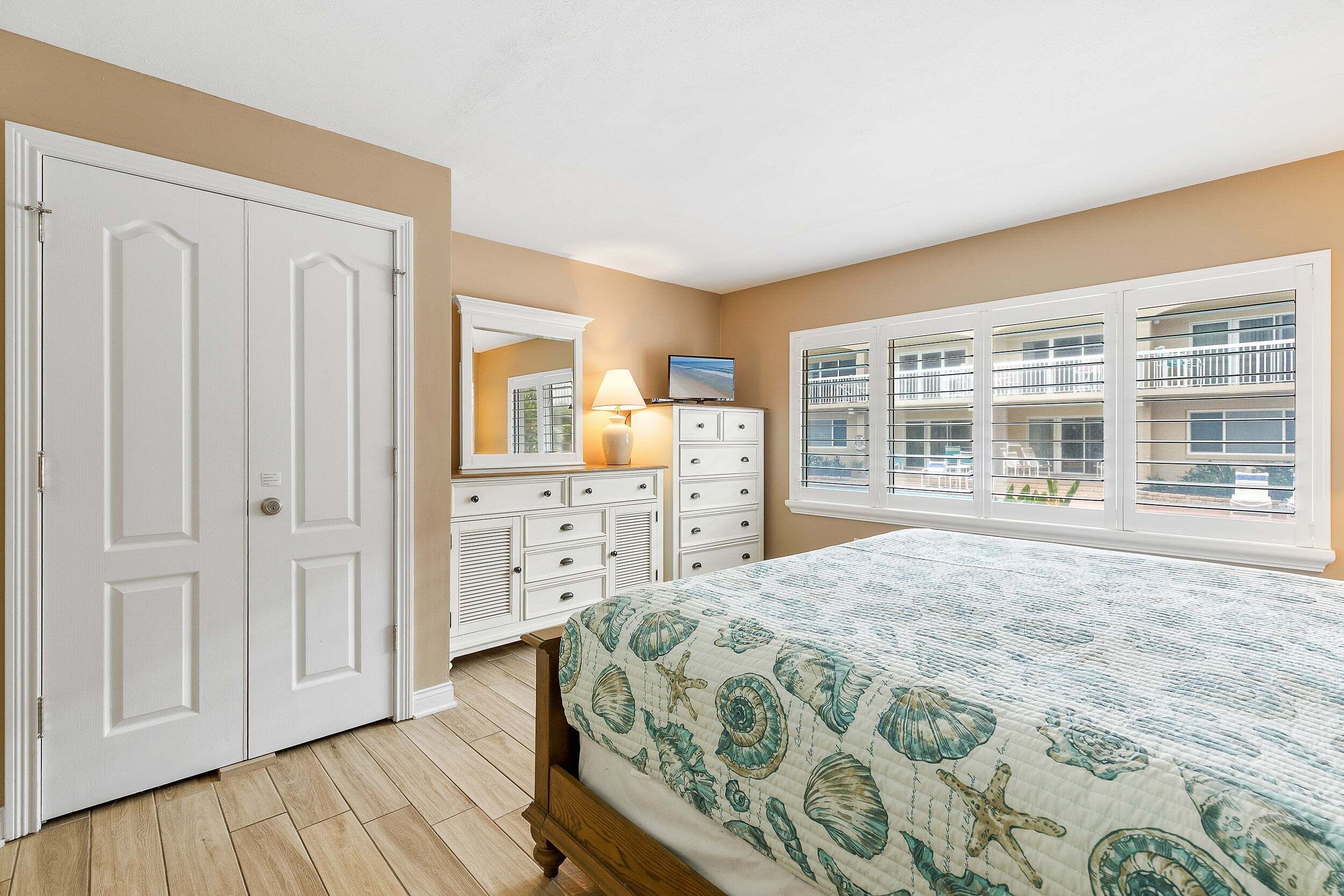 Condo, Multiple Beds, Patio, Pool View (Win-San C102) | 2 bedrooms, individually decorated, individually furnished