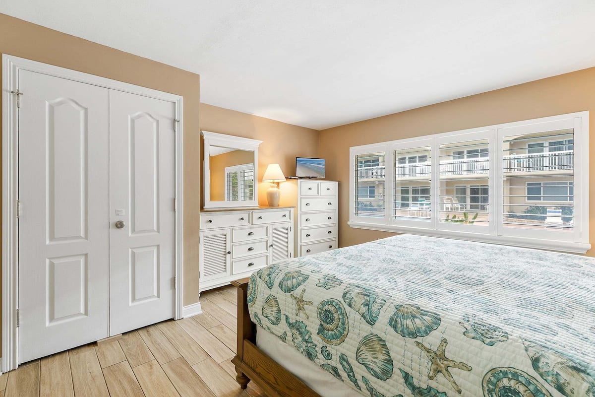 Condo, Multiple Beds, Patio, Pool View (Win-San C102) | 2 bedrooms, individually decorated, individually furnished