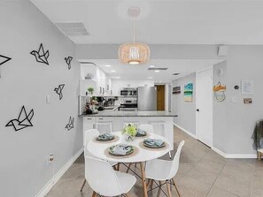 Condo, Multiple Beds, Balcony, Pool View (Win-San C209) | Dining