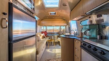 Deluxe Double Room, Patio | Living area