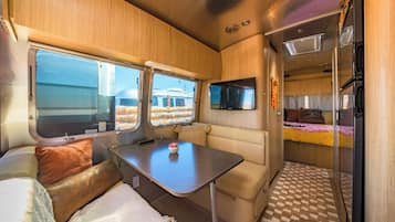 Deluxe Double Room, Patio | In-room dining