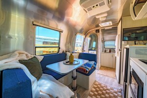 Deluxe Double Room, Patio | In-room dining