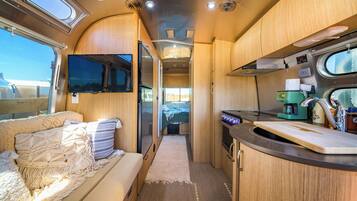 Deluxe Double Room, Patio | Living area
