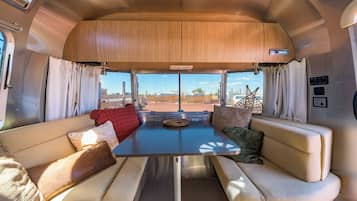 Deluxe Double Room, Patio | In-room dining