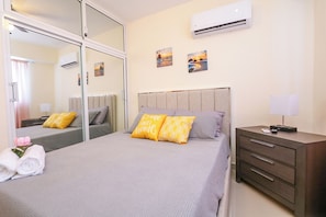 Appartamento, 2 camere da letto, bagno privato, vista città | Una cassaforte in camera, Wi-Fi gratuito