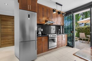 Fridge, microwave, stovetop, coffee/tea maker