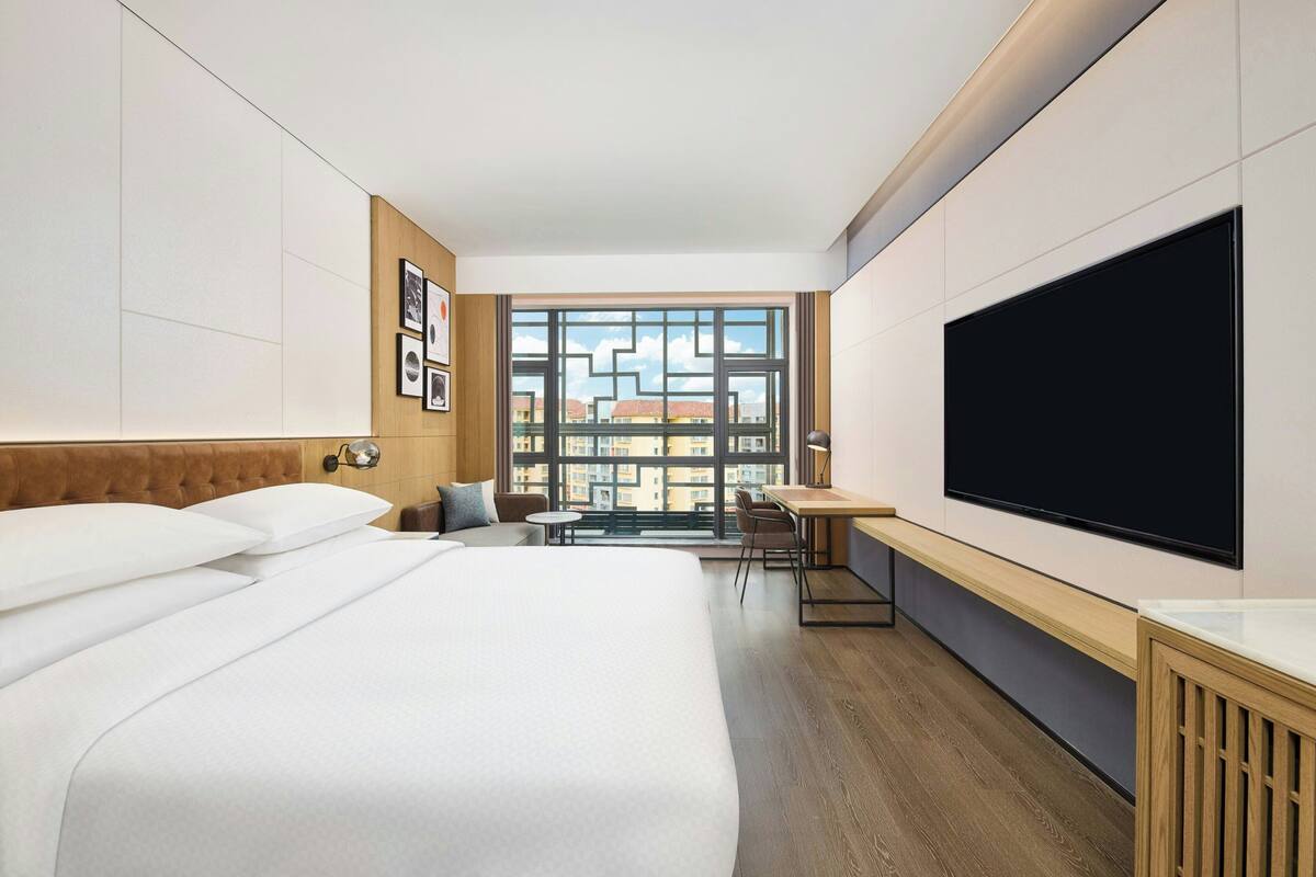 Premium bedding, down comforters, Select Comfort beds, in-room safe