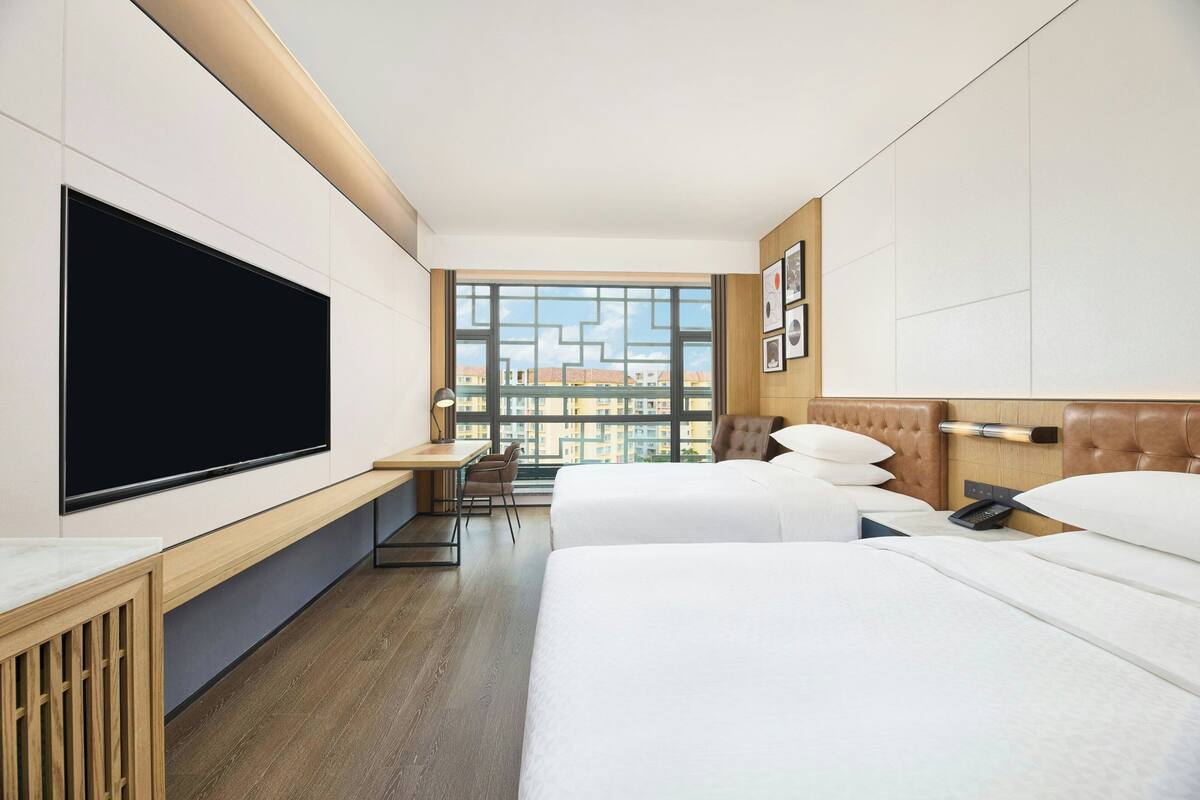 Premium bedding, down comforters, Select Comfort beds, in-room safe