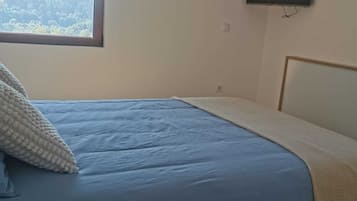 Fer et planche à repasser, draps fournis