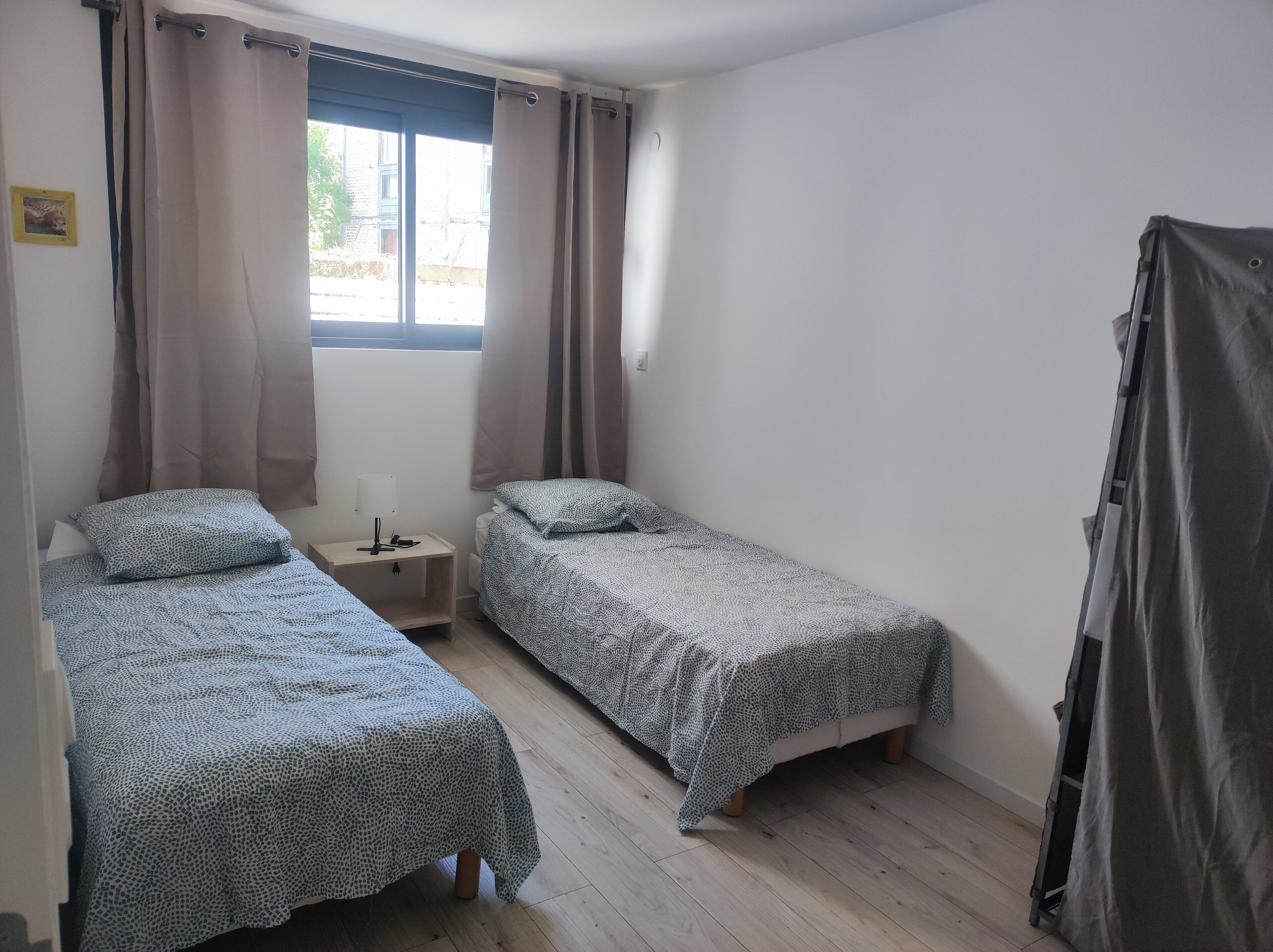 2 dormitorios, tabla de planchar con plancha, wifi y ropa de cama