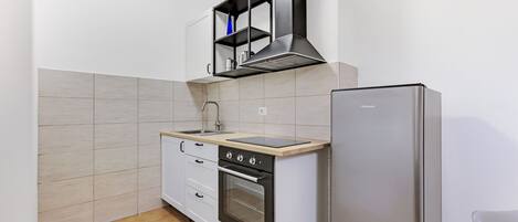 Apartament Comfort | Cuina privada | Productes de neteja i congelador