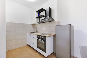 Apartamento conforto | Cozinha privada | Produtos de limpeza, freezer