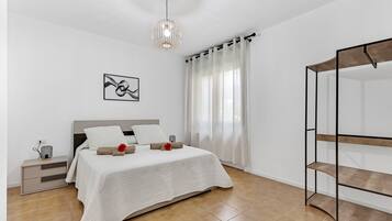 Premium bedding, down comforters, iron/ironing board, free WiFi