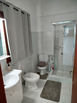 Shower, free toiletries, hair dryer, slippers