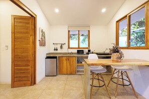 Fridge, microwave, stovetop, coffee/tea maker