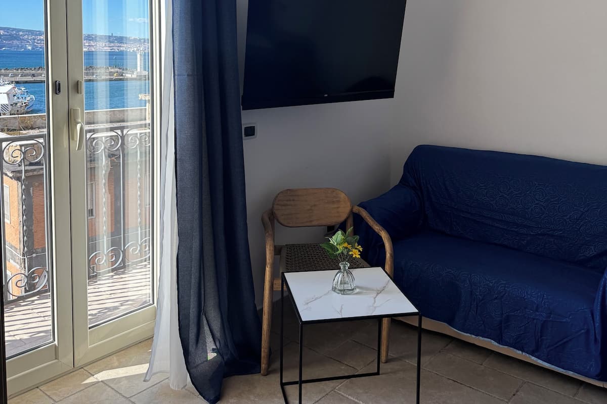 Deluxe Quadruple Room, Sea View | WiFi (free), bed sheets