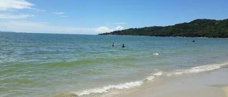 On the beach, white sand