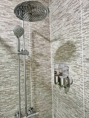 Shower, hair dryer, towels, soap