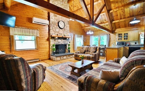 Beautiful cabin situated on wooded banks of the Shenandoah River.