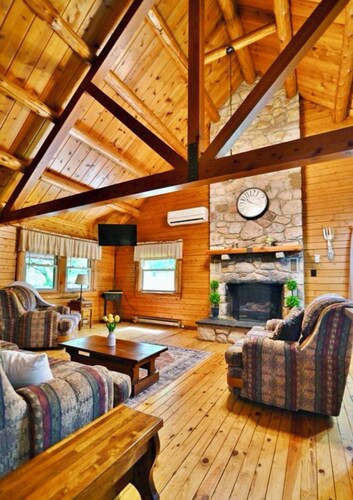 Beautiful cabin situated on wooded banks of the Shenandoah River.