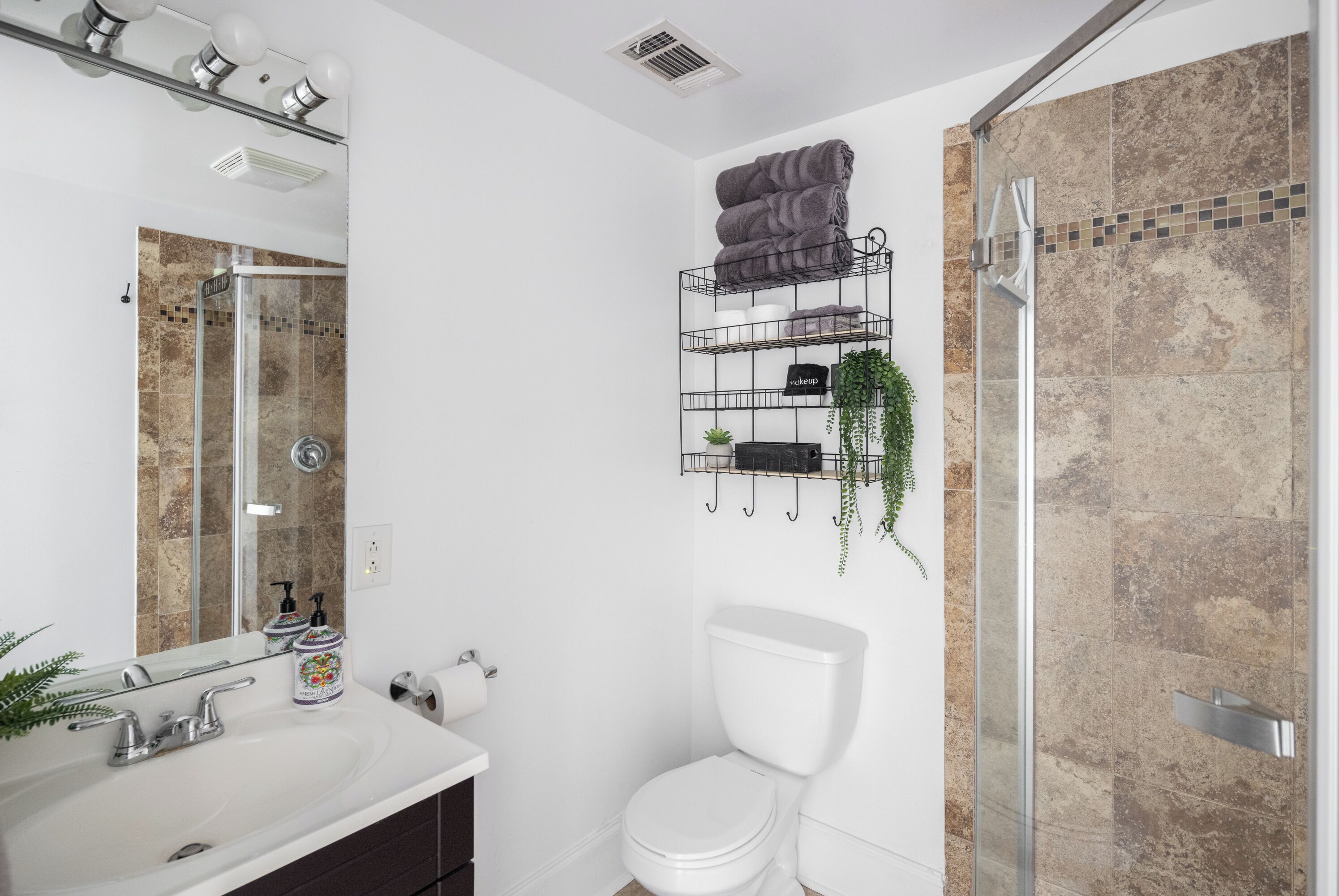 Hair dryer, towels, soap, toilet paper