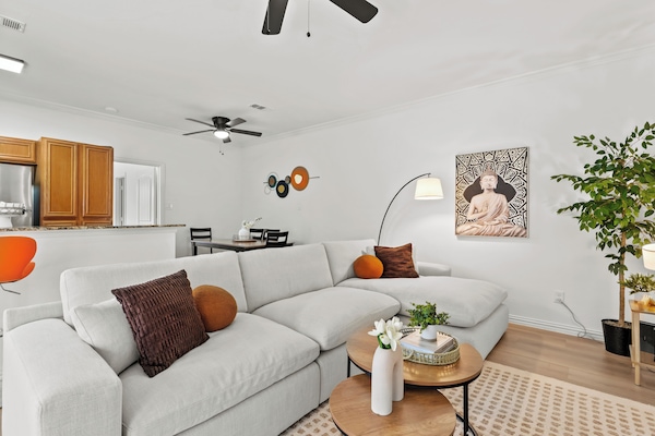 Step into a bright, open-concept living area that blends comfort and elegance.
