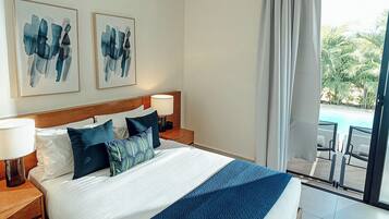 Premium bedding, free minibar items, in-room safe, laptop workspace