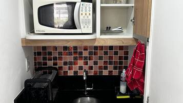 Fridge, microwave, coffee/tea maker, toaster