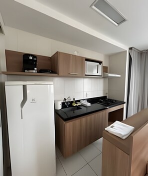 Fridge, microwave, coffee/tea maker, toaster