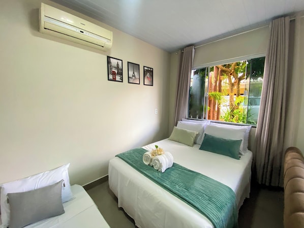 Family Studio, Patio, Garden Area | Iron/ironing board, free WiFi