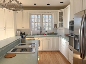 Fridge, stovetop, coffee/tea maker