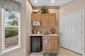 Fridge, microwave, coffee/tea maker, toaster